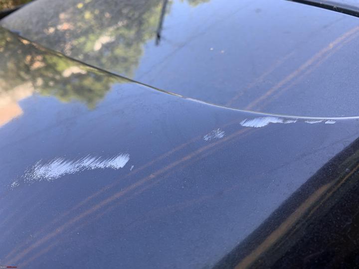 Toll plaza's boom barrier hits my car's roof & rear spoiler 